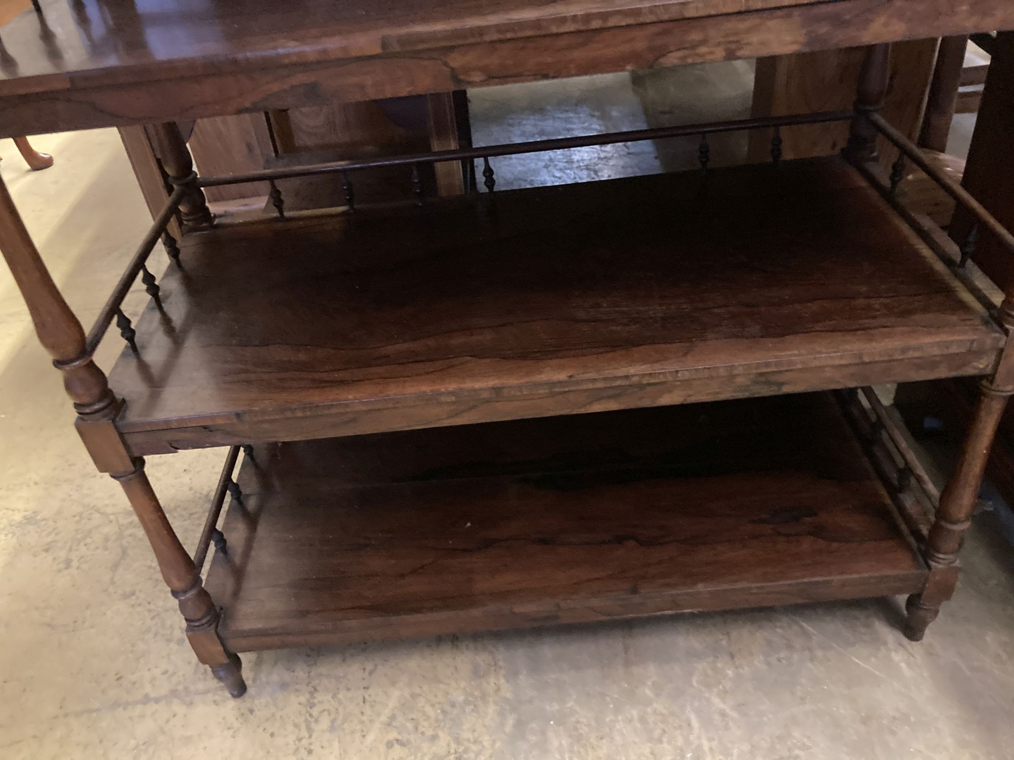 A Victorian rosewood three tier whatnot with marble top, width 69cm, depth 32cm, height 83cm